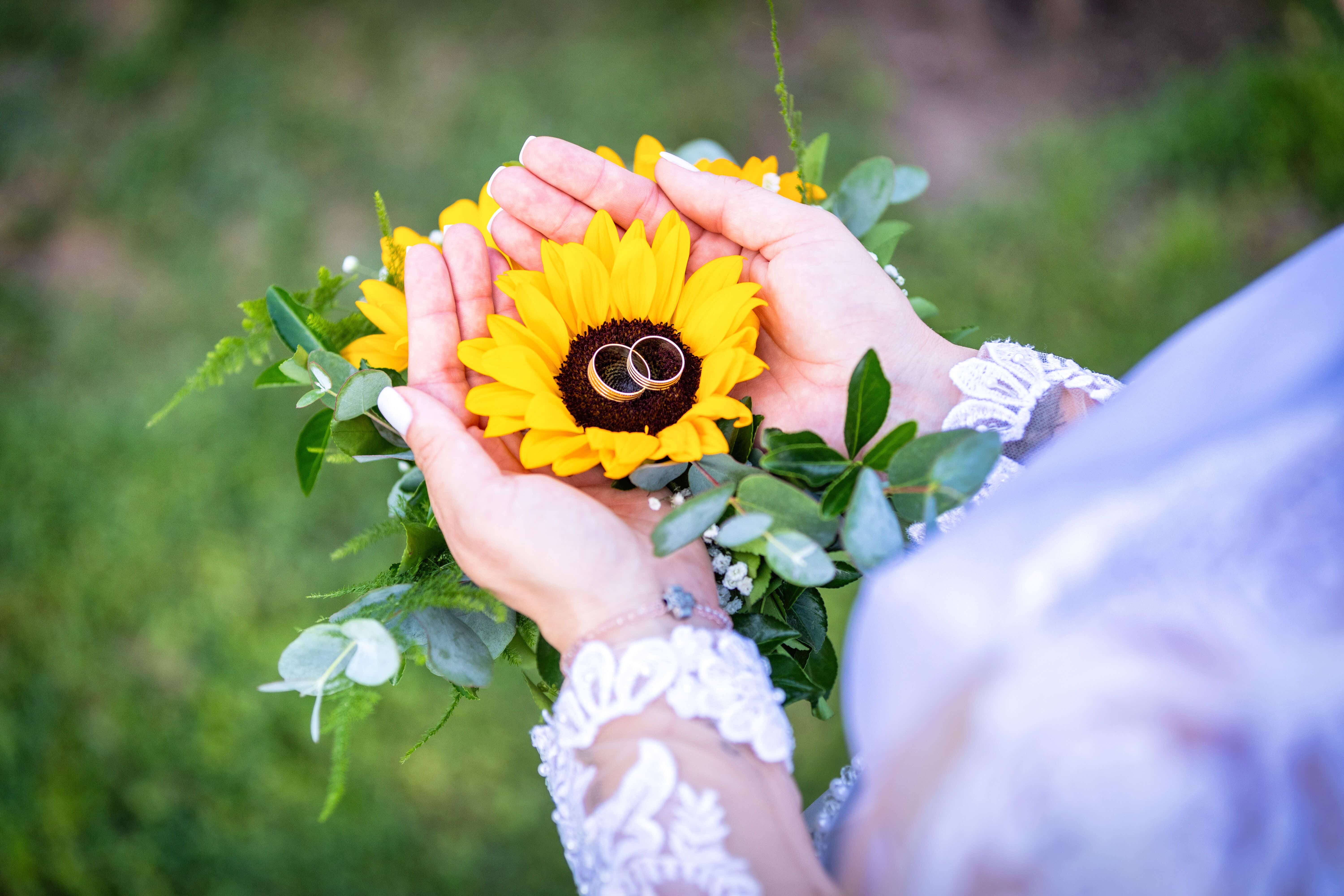 A bride holding her wedding bouquet